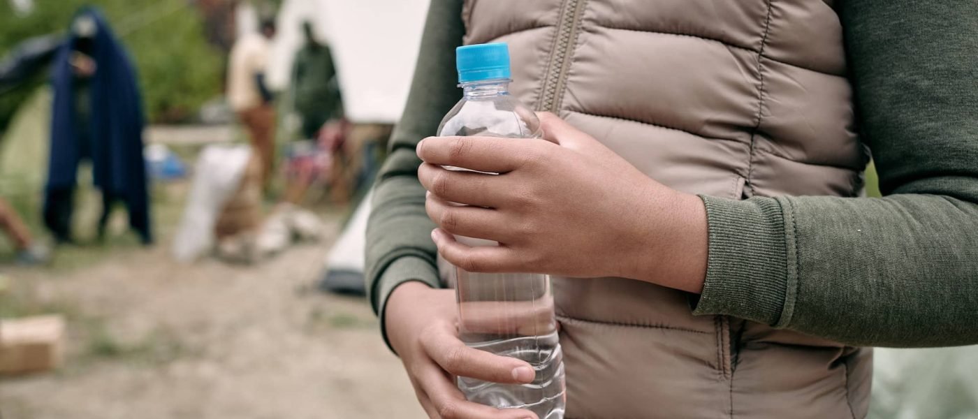 unrecognizable-girl-with-bottle-of-water.jpg